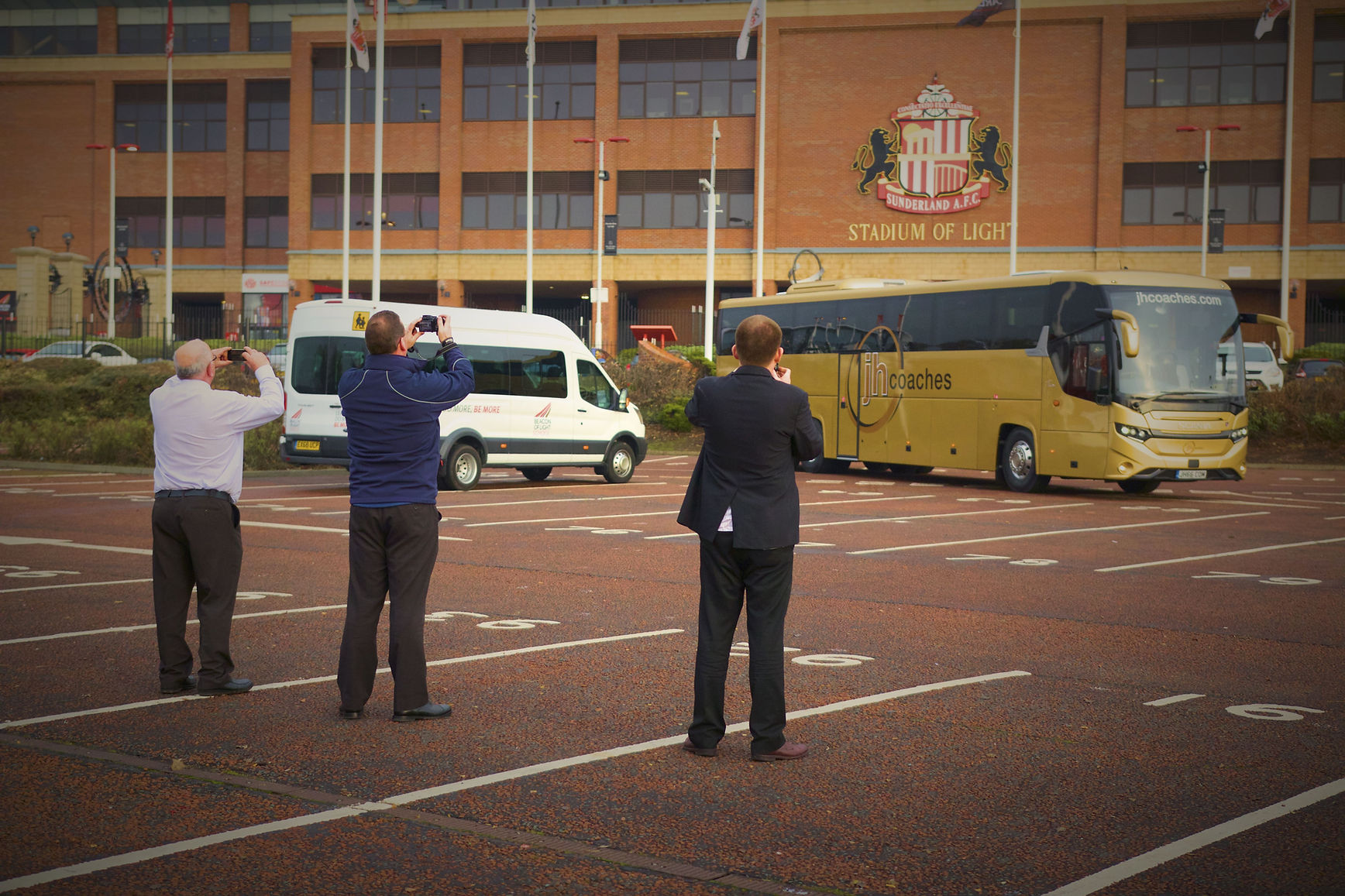Coach outside stadium