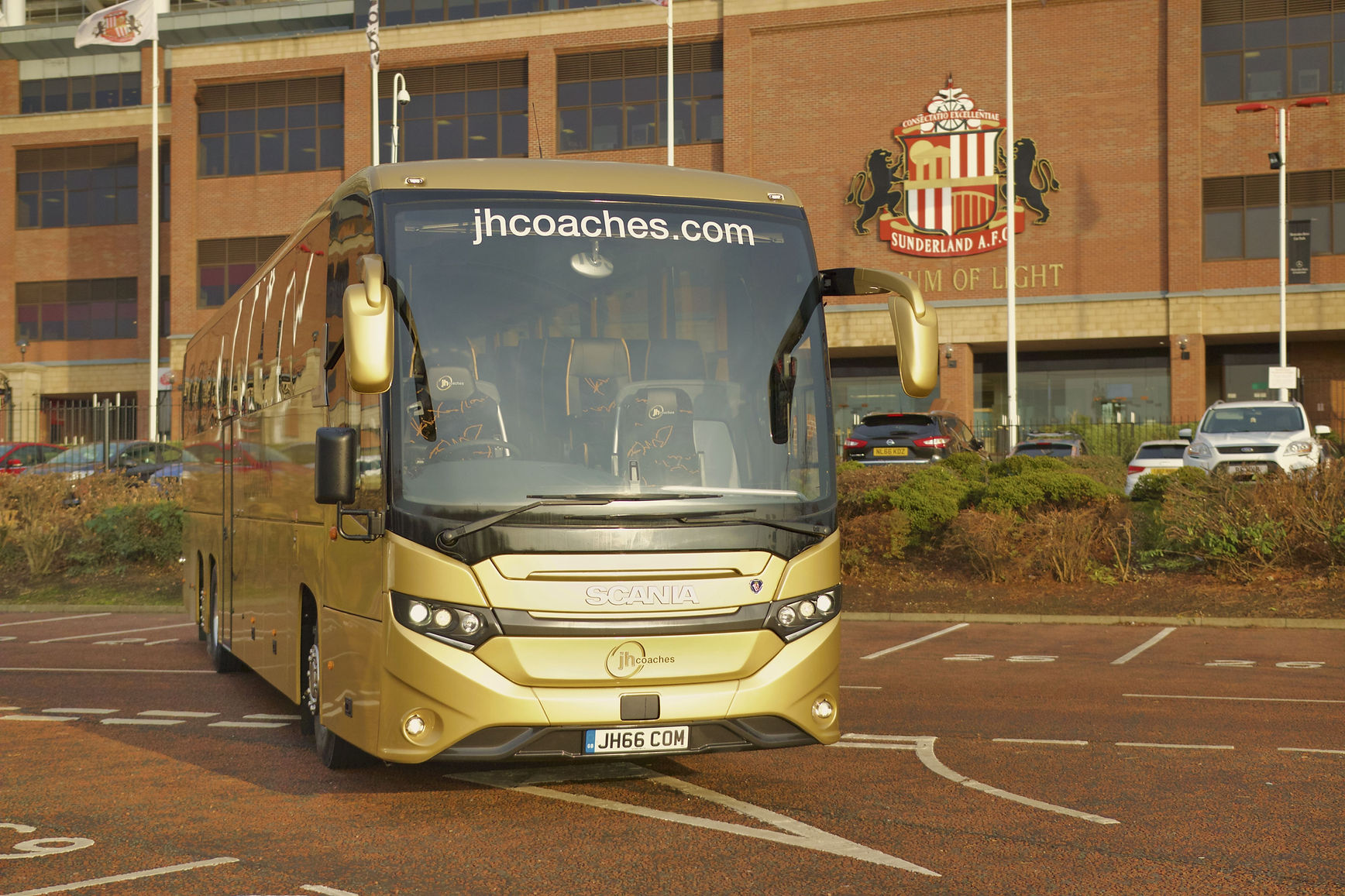 Coach outside stadium