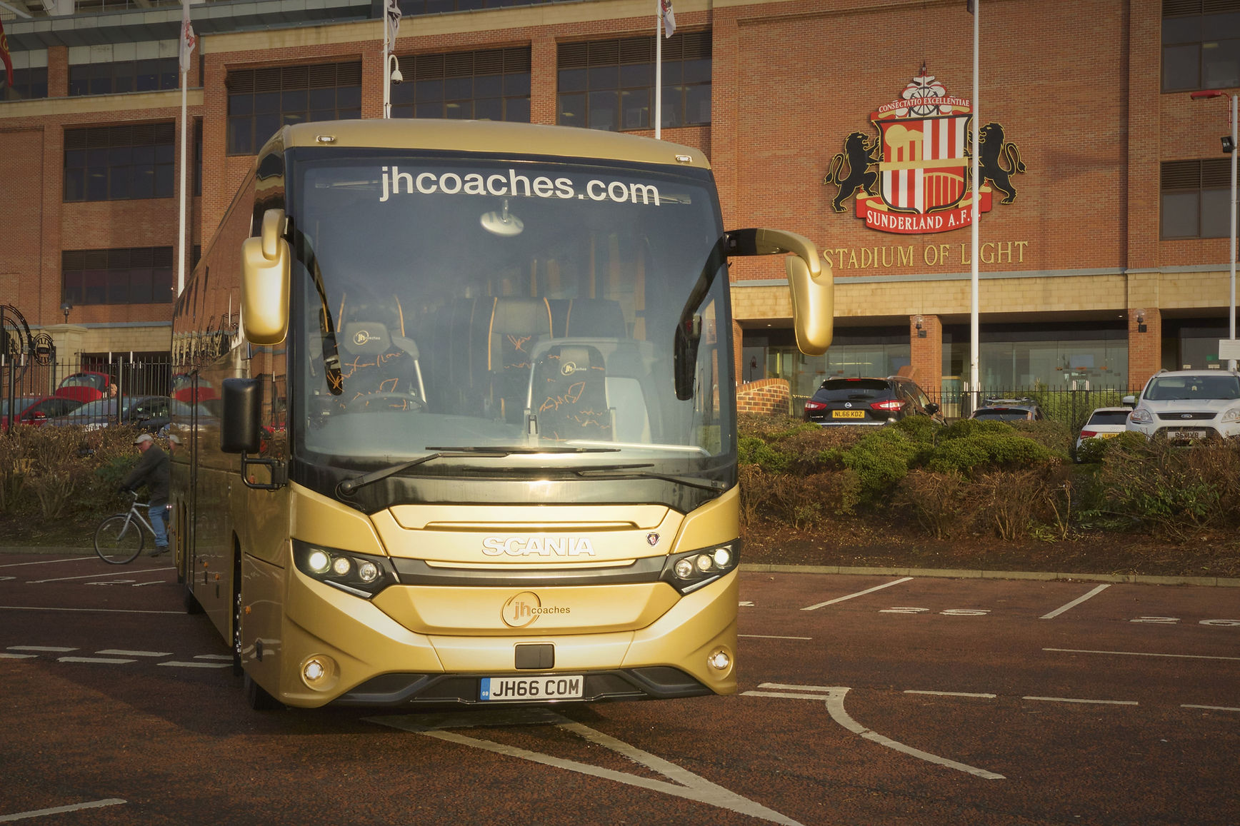 Coach outside stadium